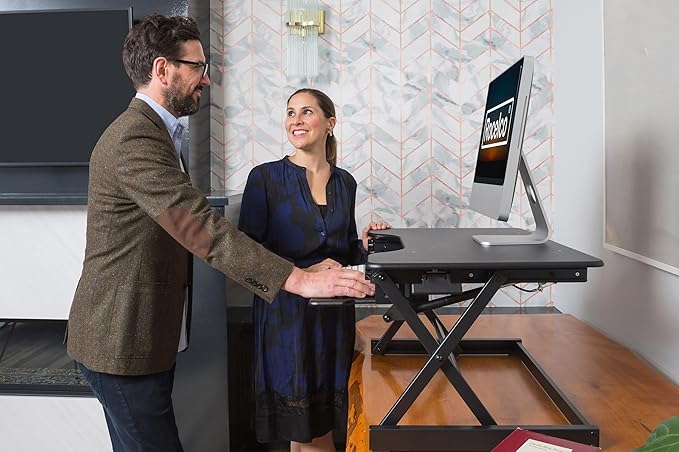 Rocelco 40" Height Adjustable Standing Desk Converter with AC Outlet and USB Charger - Gas Spring Sit Stand Up Dual Monitor Tabletop Riser Workstation - Large Keyboard Tray - Black (R DADRB-40-ACUSB)